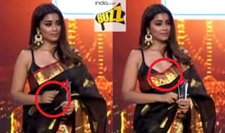 Shriya Saran goes naughty in viral video! Hot Telugu actress pulls down saree to expose her cleavage