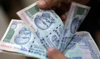 Rupee Gains 8 Paise to 71.49 Versus USD in Early Trade
