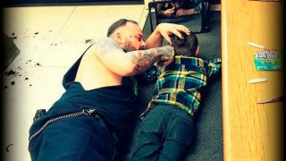Canadian Barber Lies On The Floor To Cut Autistic Boy's Hair, Picture Goes Viral