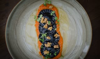 Impress Your Friends With this Spooky Pumpkin and Charcoal Ravioli at Your Halloween Party!