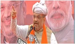 अमित शाह का पलटवार, राहुल को इटली नहीं गुजरात का चश्मा पहनना होगा