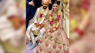 Virat Kohli - Anushka Sharma's Wedding Picture Fails To Impress The Fashion Police Virat Kohli - Anushka Sharma's Wedding Picture Fails To Impress The Fashion Police