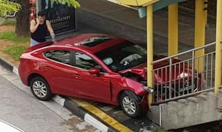 Singapore Woman Crashes Car Into Bridge After She Spots a Cockroach in Her Red Mazda