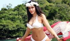 Gizele Thakral Sizzles In A Hot White Bikini In Her Latest Photoshoot - View Pics