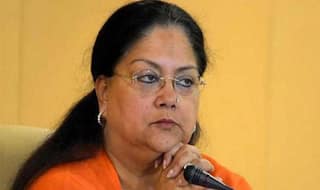 Raje Hits Back at Sharad Yadav, Asks EC to Take Action Against Him 'For Insulting Women'