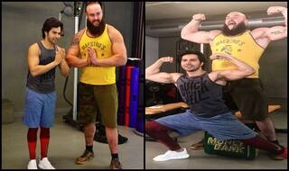 Varun Dhawan Meets WWE Superstar Braun Strowman, Competes in Flexing Contest