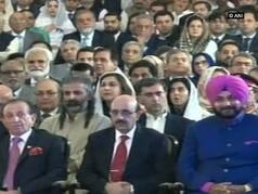 Sidhu Hugs Pak Army Chief, Sits Next to PoK Prez; Faces Criticism