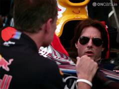 Tom Cruise gets behind the wheel of a Red Bull F1 car