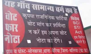 बलिया में ग्रामीणों ने लगायी होर्डिंग: गांव सामान्य वर्ग का है, वोट मांगकर शर्मिंदा ना करें