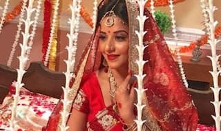 Monalisa Spells Elegance in This Red Bridal Outfit, See Pictures