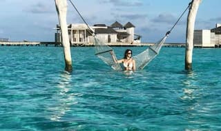 Hotness Alert! Disha Patani Flaunts Her Beach Ready Curves in White Bikini - See Pic