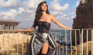 Disha Patani Sizzles as She Poses in Thigh-High Boots And Strapless Metallic Gown