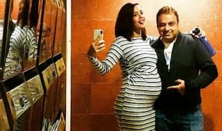 Surveen Chawla Looks Adorable as She Poses With Hubbie And Baby Bump