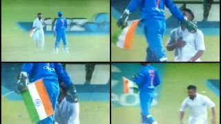 India vs New Zealand 3rd T20I: MS Dhoni Acquires God-Like Status After Fan Carrying National Flag Halts Match to Touch His Feet in Hamilton | WATCH VIDEO