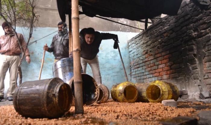 Toxic bootleg alcohol kills at least 99 people