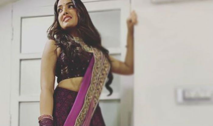 Amrapali Dubey Steals The Show in Sheer Purple Lehenga Amrapali Dubey Steals The Show in Sheer Purple Lehenga