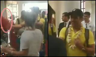 Cuteness Alert! Dhoni Throws Flower at Sakshi, we Bet You Cannot Miss it | WATCH