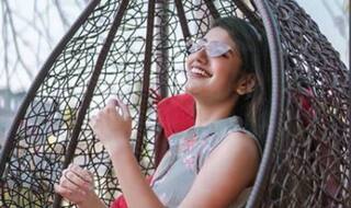 Priya Prakash Varrier Will Make Your Jaws Drop in Floral Grey Dress as She Relaxes on Swing Chair