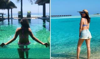 Sophie Choudhary Raises Hotness Quotient in Stripped Blue Bikini While Basking in The Sun as She Vacays in Maldives