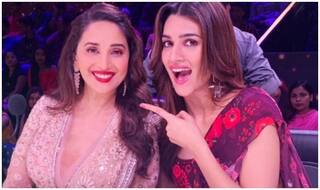 Kriti Sanon Lives Her 'Fan Girl Moment' With Madhuri Dixit as They Blow Kisses And 'Shoot' Together at Fans