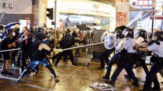 Hong Kong Police Fire Gun, Use Water Cannon on Protesters