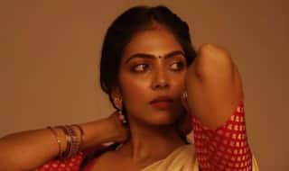 Beyond The Clouds Actor Malavika Mohanan Flaunts Her Sexy Curves in White-Gold Saree
