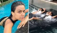 Nia Sharma Sets Her Fans Heart Aflutter in Hot Black Monokini as She Takes Water Bed Massage in The Pool
