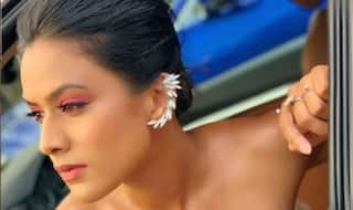 Television Hottie Nia Sharma Looks Her Sexiest Best in Pink Off-Shoulder Dress And Matching Eye Makeup