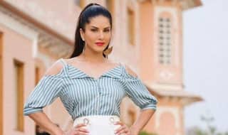 Sunny Leone Looks Stunning in Cold-shoulder Top And White Shorts But Her 'Wild Cherry' Lipstick is Stealing The Show