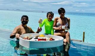Mandira Bedi Looks Hot in Sexy White Bikini as She Indulges in Delicacies Along With Husband And Daughter