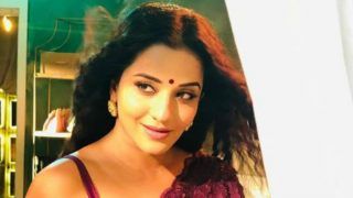 Bhojpuri Bombshell Monalisa Looks Sizzling Hot in Maroon Saree as She Strikes Sultry Pose in Mohona Avatar