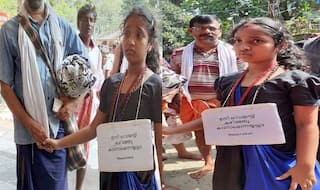 सबरीमाला पहुंची 9 साल की बच्ची बनी चर्चा का केंद्र, गले में लटकाया तख्ती, लिखा 50 साल की होने पर आऊंगी