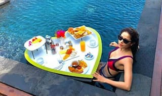 Nushrat Bharucha Enjoys Floating Breakfast in Sexy Pink-purple Bikini as She Takes a Dip in The Pool in Maldives