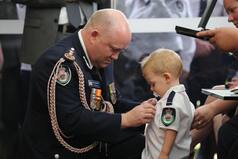 Heartbreaking! Toddler Receives Medal For His Firefighter Dad Who Died in Australian Bushfires