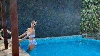 Krystle D’Souza Looks Smoking Hot in Halter-neck White Floral Bikini as She Takes a Dip in The Pool
