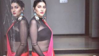 Haryanvi Dancer Sapna Choudhary Flaunts Toned Body in Sexy See-Through Blouse And Red Saree