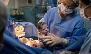 Newborn Stares Down Doctor Minutes After Coming Into The World, Leaves Netizens Amused