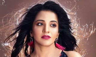 Bhojpuri Sizzler Monalisa Looks Sensuously Hot in Blue Floral Dress in Throwback Picture