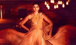 Karishma Tanna Turns Heads in Plunging Beige Gown as She Attends Radio Mirchi Music Awards