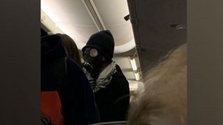 Man Gets Kicked Out of American Airlines Flight For Wearing a Full Gas Mask