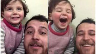 Heartbreaking! Syrian Man Makes Up 'Laughing Game' to Distract Daughter from Sounds of Bombs | Watch