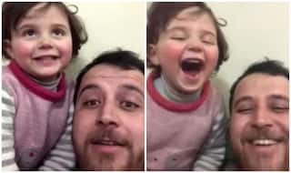 Heartbreaking! Syrian Man Makes Up 'Laughing Game' to Distract Daughter from Sounds of Bombs