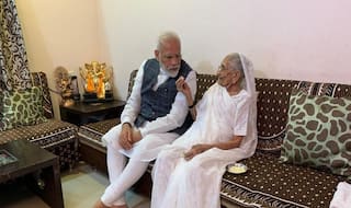 PM Modi   s Mother Heeraben Modi Lights up Lamp, Joins Fight Against Coronavirus