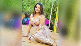 Bhojpuri Bombshell Monalisa Sets Internet on Fire As She Poses In Sexy Pink Suit