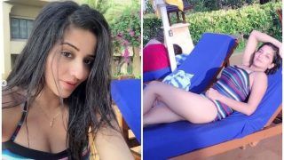 Bhojpuri Sizzler Monalisa Looks Uber Hot in Halter-neck Monokini as She Strikes Sensuous Pose on Lounger