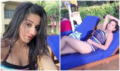 Monalisa Looks Uber Hot in Halter-neck Monokini as She Strikes Sensuous Pose on Lounger