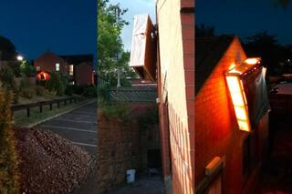 I Thought I Was Hallucinating: Woman After Finding Bed Hanging From Light Fixture Outside Her House