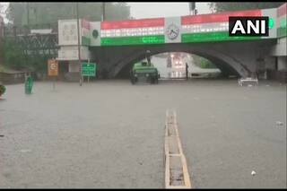 Delhi Rains: Bus Gets Stuck in Waterlogged Road, Fire Services Personnel Rescue Passengers