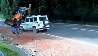 Such a Miracle! Narrow Escape For Biker As Bolero Rams into Speeding JCB | Watch Jaw-Dropping Video