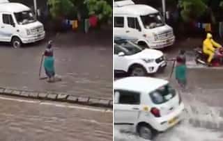 Mumbai Woman Stands in Rain For 5 Hours to Warn Commuters of Open Manhole | Watch